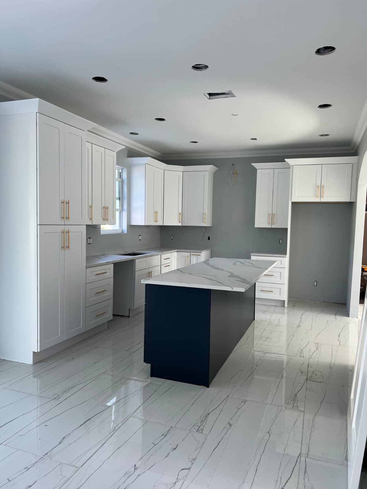 Full kitchen build with navy island